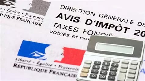 A PROPOS DE LA TAXE FONCIÈRE